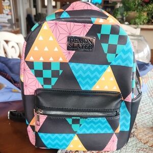 Bioworld Demon Slayer Geometric Backpack - Black, Yellow, Blue, Pink